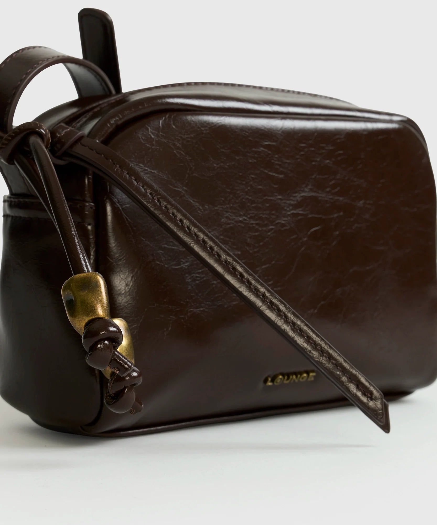 Cartera Bandolera Charm Pelotas Doradas Woman