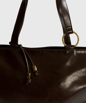 Bolso Notebook Charm Pelotas Doradas Woman