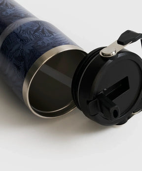 Botella Térmica Estampado de Lounge con diseño estampado y tapa negra, ideal para bebidas frías y calientes.