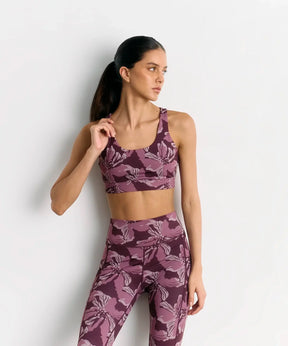Peto Deportivo Flores Active de Lounge, ideal para entrenamientos, fondo de flores y diseño de tela elástica.