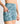Short Deportivo Biker Flores Active de la marca Lounge, diseño floral con bolsillo lateral, ideal para el movimiento.