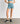 Short Deportivo Biker Flores Active de Lounge, diseño floral, tejido flexible y cómodo, con bolsillo lateral.