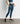 Calza Deportiva Estampado Hojas Active de Lounge, con diseño de hojas, bolsillo lateral y pretina cruzada.