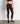 Calza Deportiva Unicolor Active de Lounge, leggings livianos y cómodos con pretina cruzada y bolsillo lateral.
