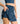 Falda Short Estampado Hojas Active de Lounge, diseño moderno con bolsillo y estampado de hojas.