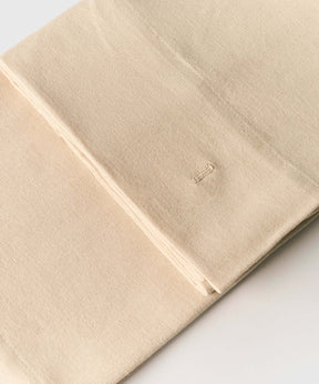 Cortina De Baño Rombos de Lounge, cortina de baño de algodón con detalles bordados en color beige.
