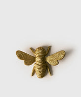 Adorno Decorativo Abeja de la marca Lounge, decorativo en forma de abeja dorada.