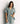 Pijama Palmeras de Lounge, camisero corto con diseño de palmeras y pantalón cómodo, ideal para descansar.