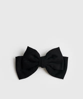 Pinche Cinta Unicolor de Lounge, diseño de cinta en negro, elegante y versátil para cualquier ocasión.
