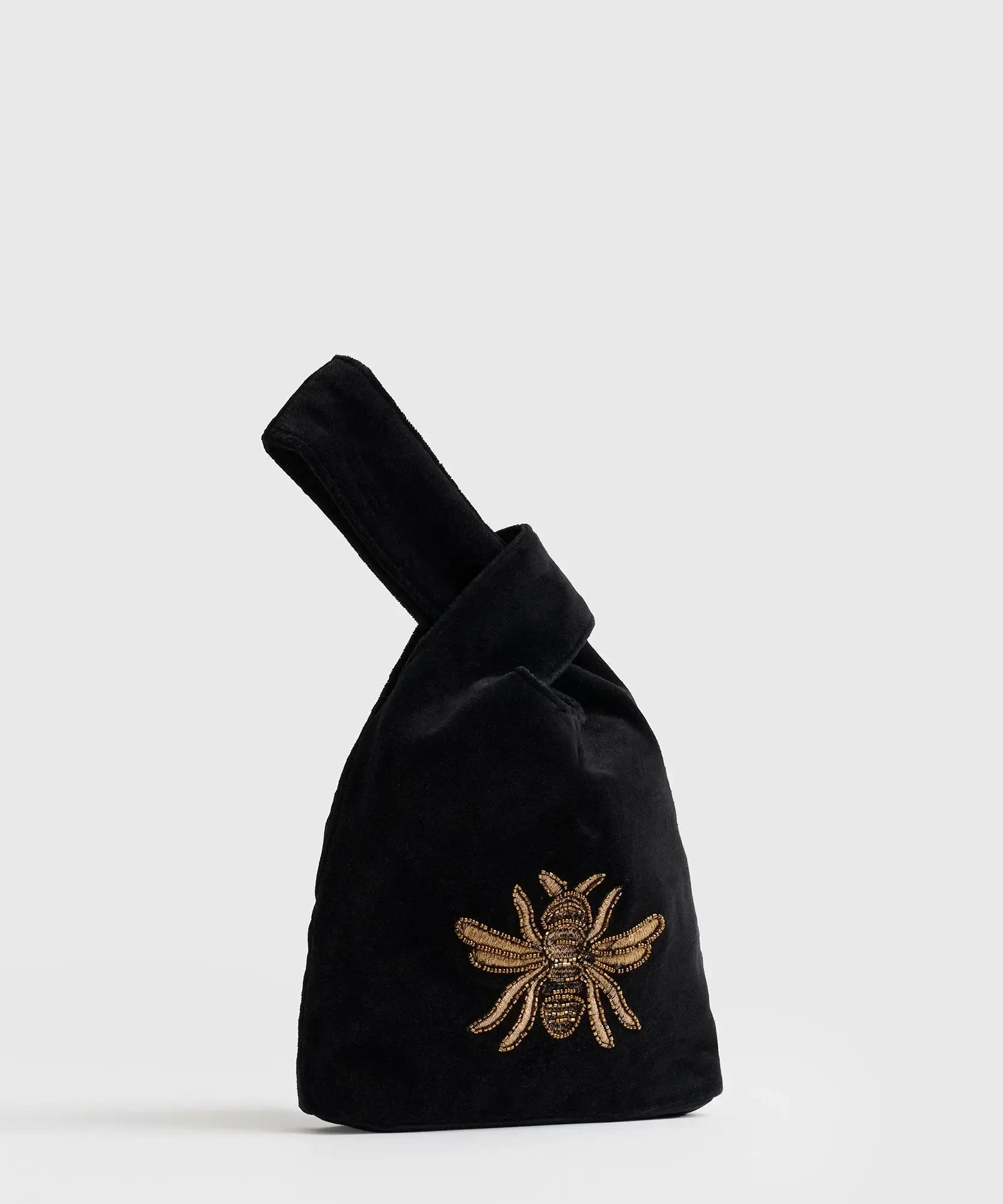 Mini Cartera Velvet Fiesta de Lounge, bolso negro con bordado de abeja y diseño elegante.