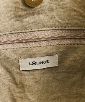 Mini Cartera Vuelos Paradiso de Lounge, con un bolsillo con cierre y etiqueta visible.