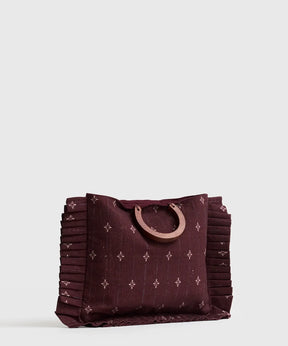 Mini Cartera Vuelos Paradiso de Lounge, cartera pequeña con asas de madera y vuelos elegantes.