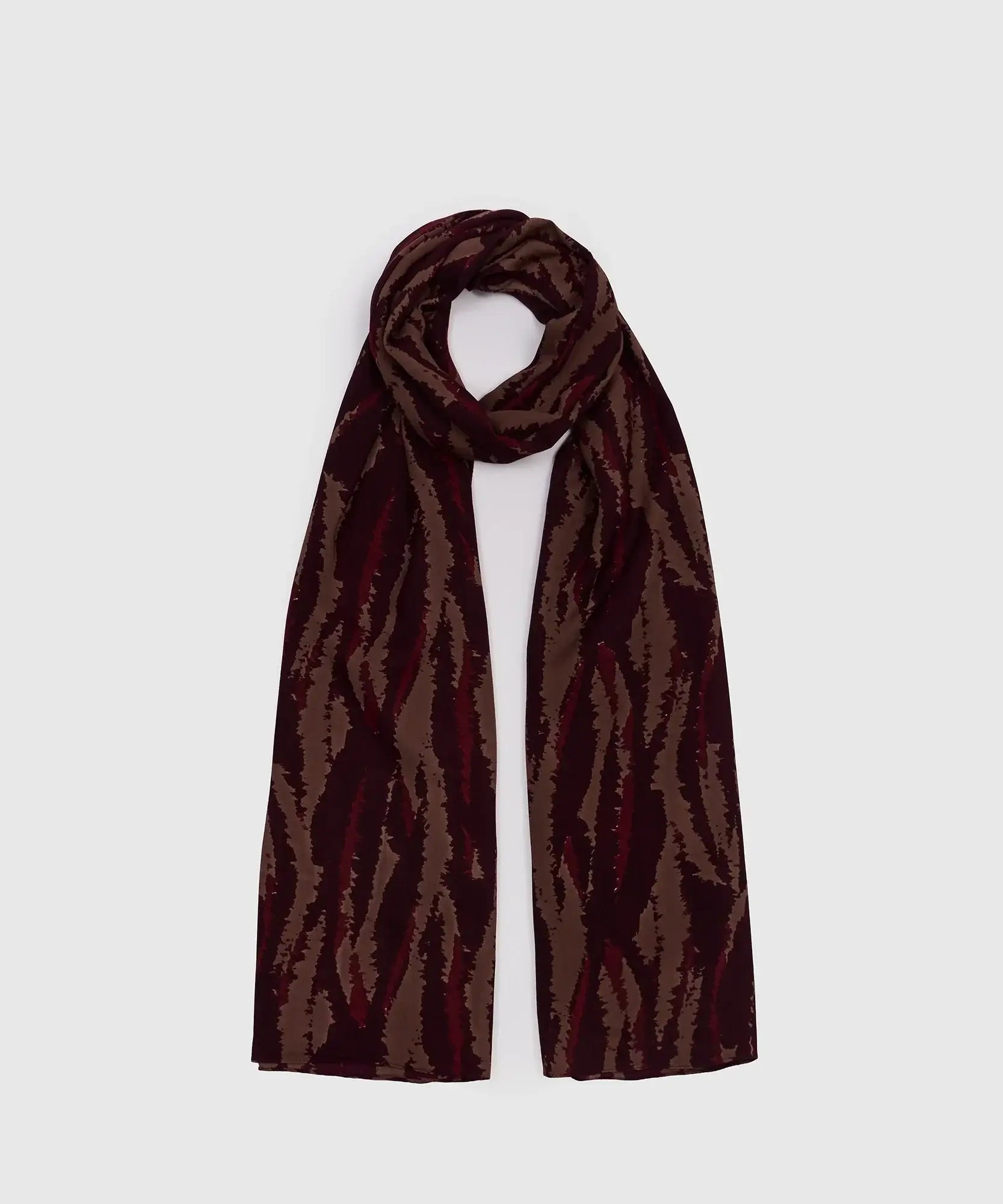 Estola Cebra de Lounge con diseño de manchas de cebra, ideal para un toque moderno y elegante.