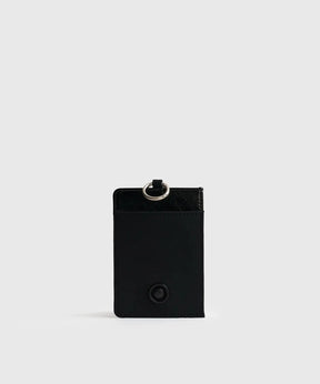 Tarjetero Alargado Street de Lounge, de nylon negro con borde efecto cuero y argolla, seis compartimientos para tarjetas.