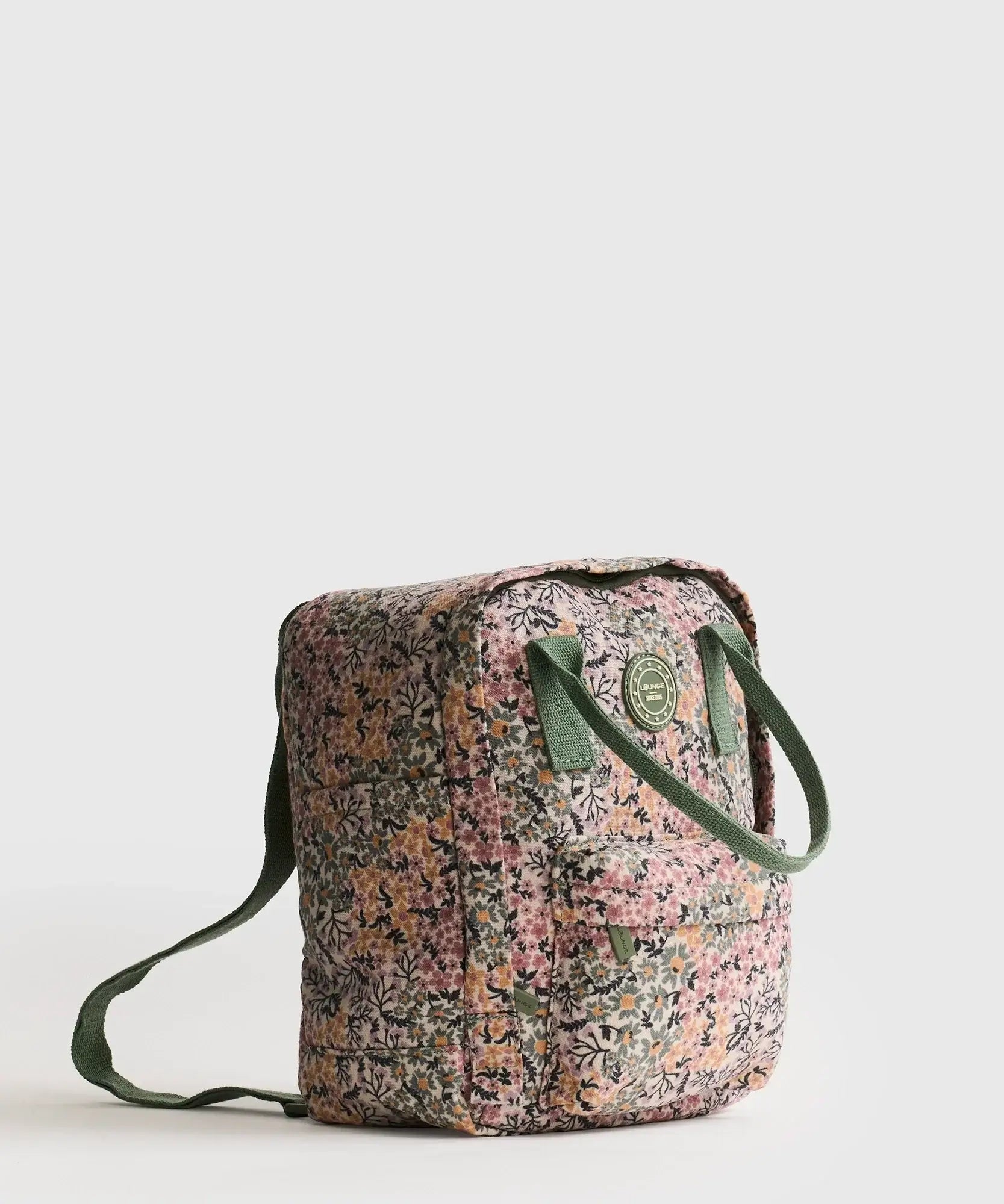 Mochila Canvas de Lounge con diseño floral, ideal para llevar pertenencias organizadas y seguras.