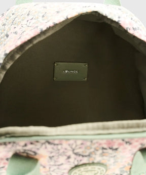 Interior view of Mochila Canvas by Lounge showing brand label and spacious design.