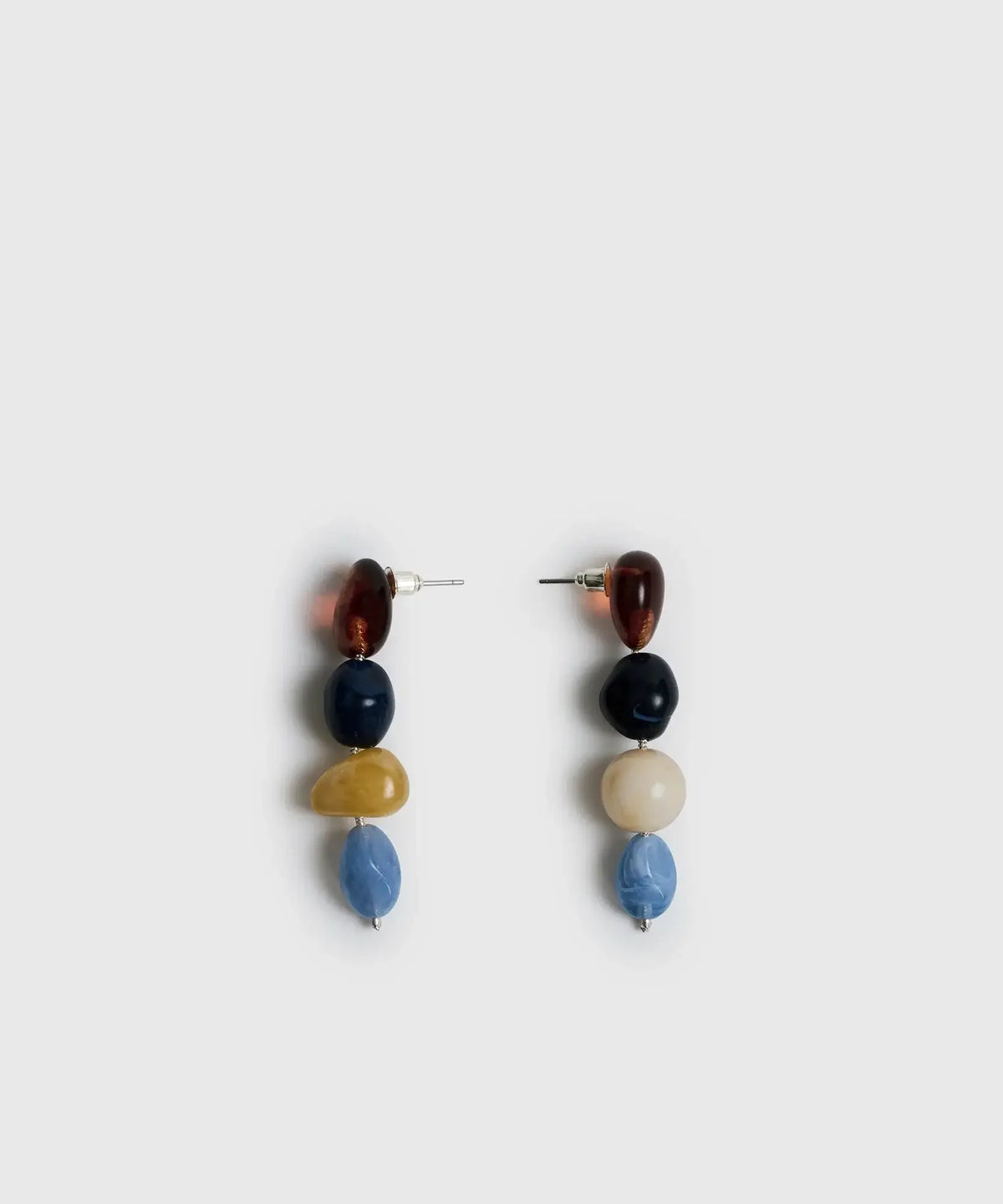 Aros Piedras Irregulares de Lounge, joyería con piedras irregulares en variedad de colores.