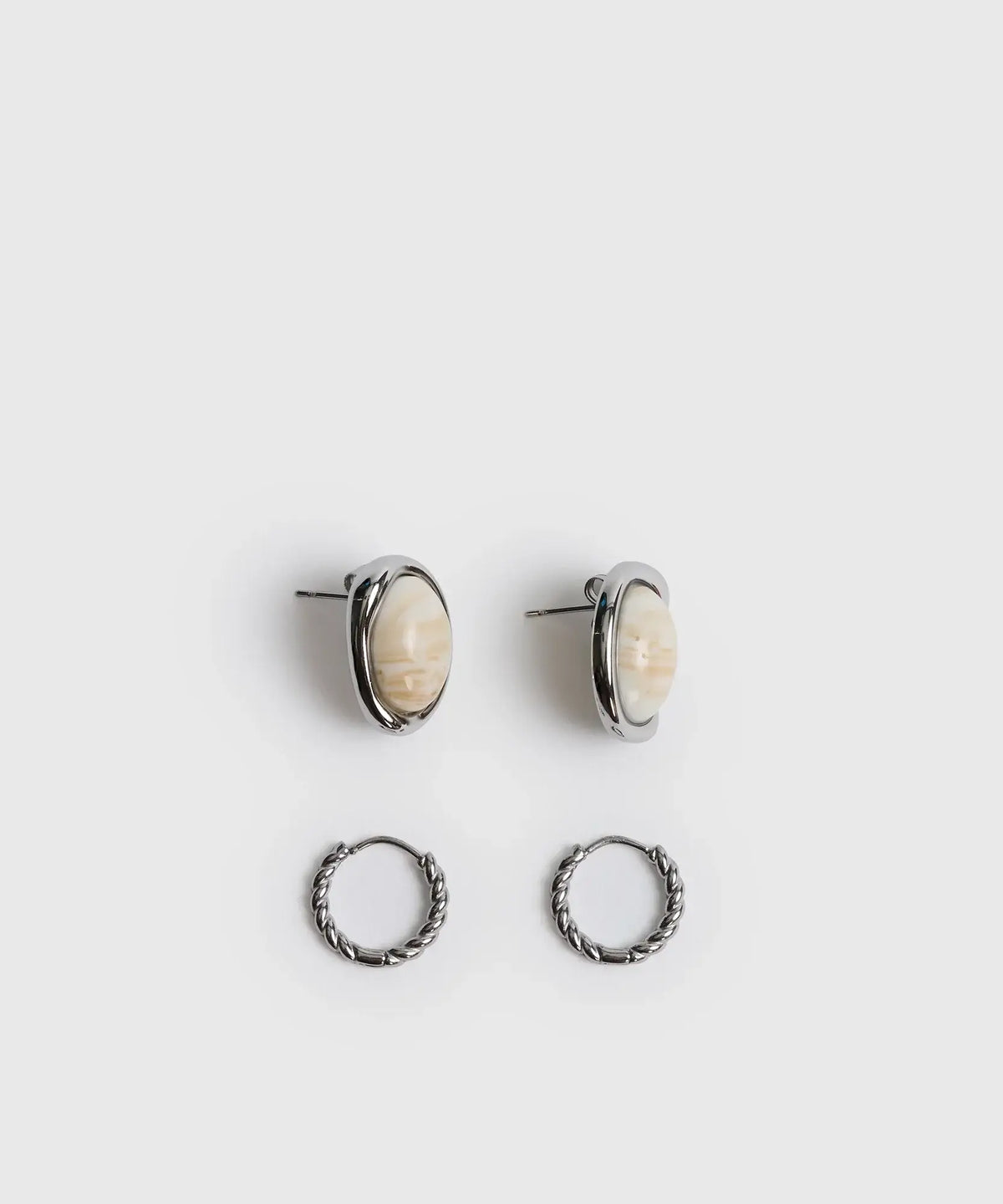 Set Aros Piedra de acero inoxidable con diseño trenzado y piedra, marca Lounge.