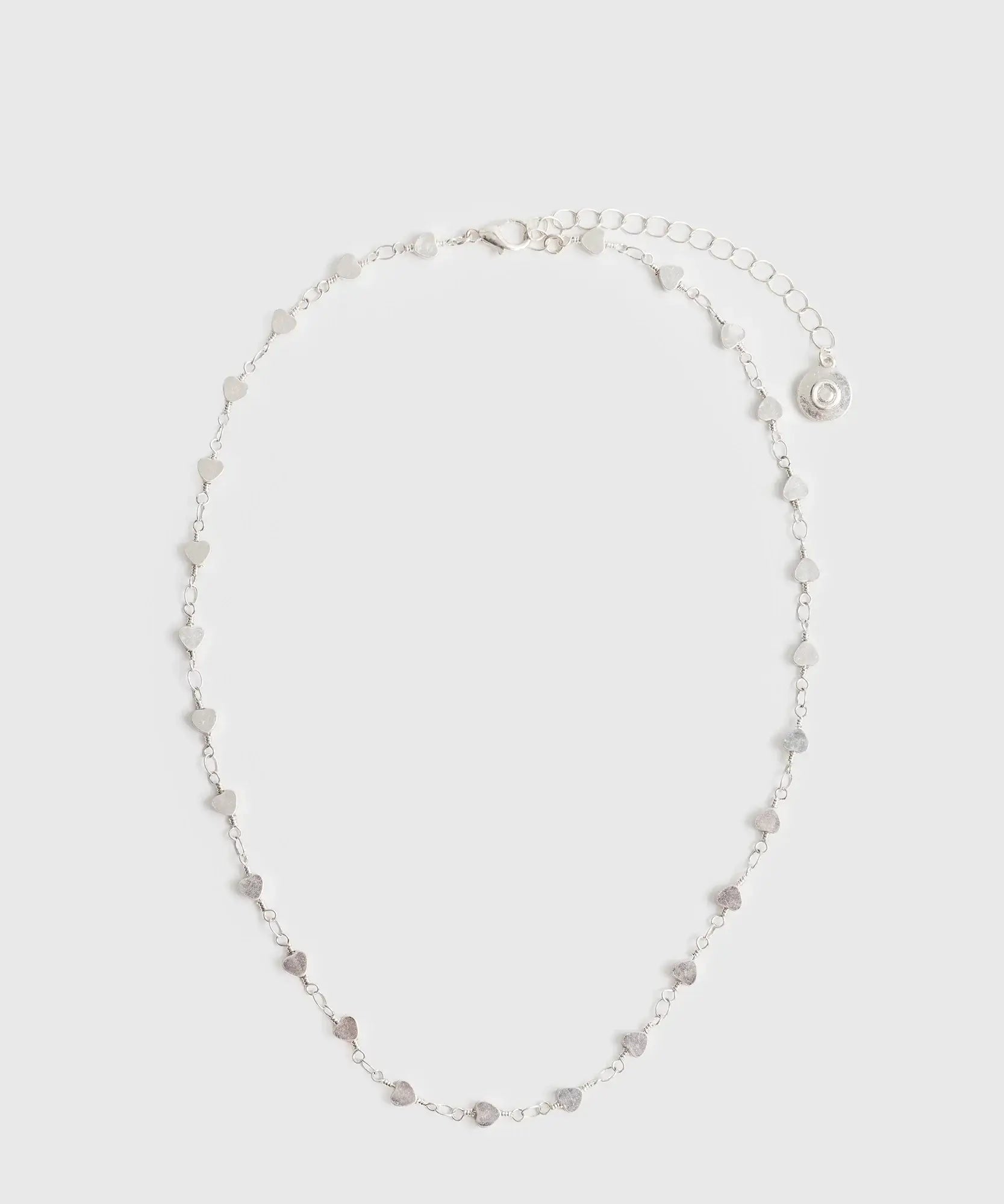 Collar Corazones Mini de Lounge, collar de cadena delgada con mini corazones en acero plateado.