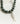 Collar Charm Street de piedras con colgante metálico en forma de pez, marca Lounge.