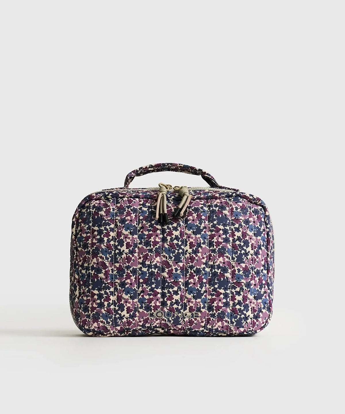 Cosmetiquero Travel Print morado de Lounge con amplio compartimento, ideal para organizar productos de belleza.