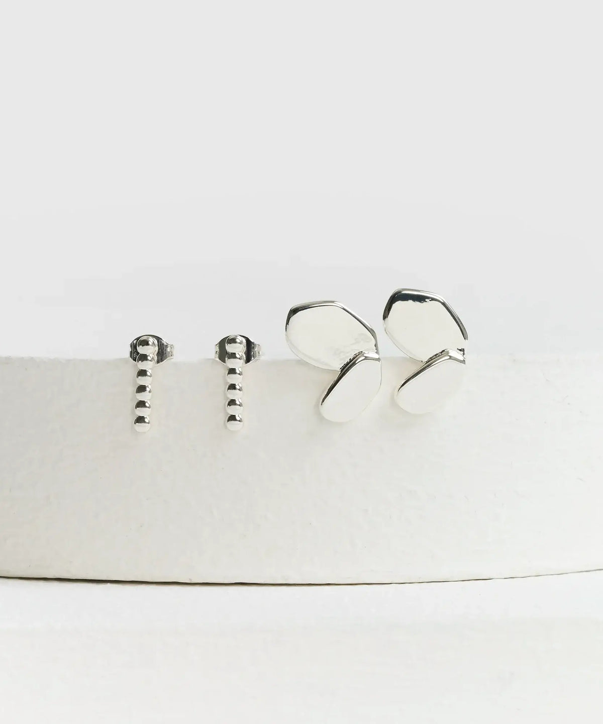 Set Aros Acero Inoxidable de Lounge: incluye aros en forma de corazón irregular y mini pelotitas.