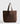 Bolso De Playa Canvas Paradiso de color café, sin cierre, con asas y bolsillo interior de la marca Lounge.