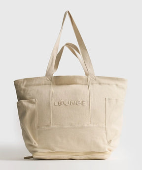Bolso Playero Antiarena beige de Lounge con múltiples bolsillos, cierre SBS y doble asa.