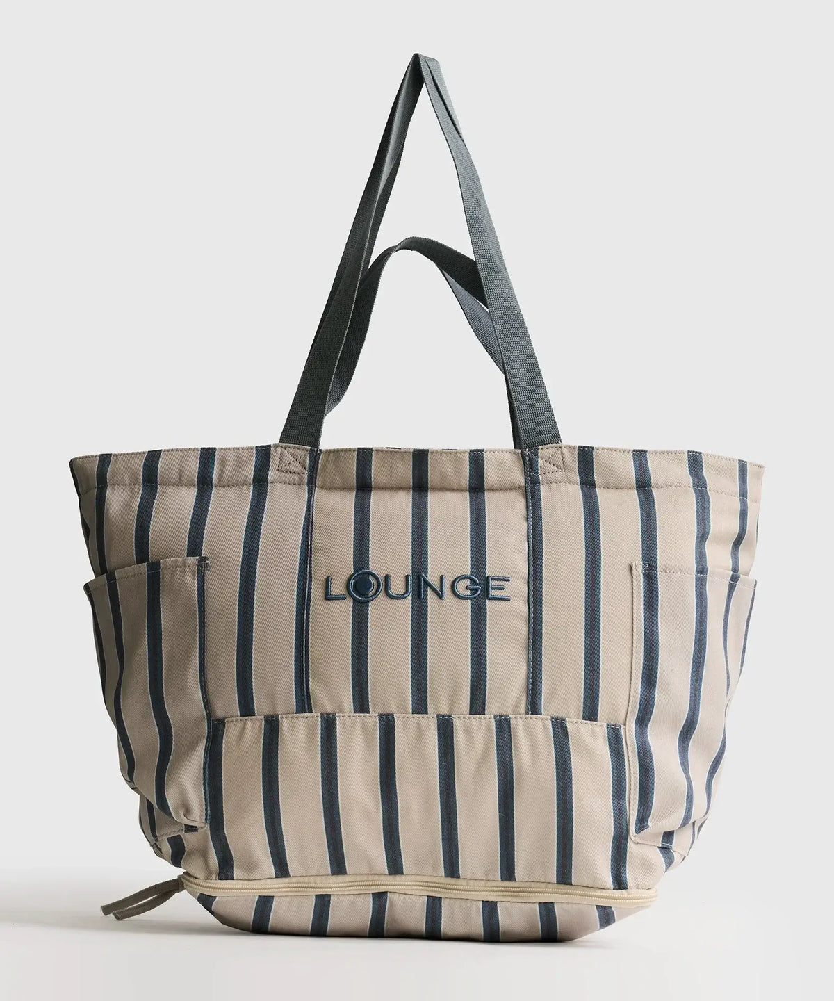 Bolso Playero Antiarena Lounge en color azul con múltiples bolsillos y malla antiarena, ideal para la playa.