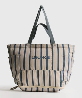 Bolso Playero Antiarena Lounge en color azul con múltiples bolsillos y malla antiarena, ideal para la playa.