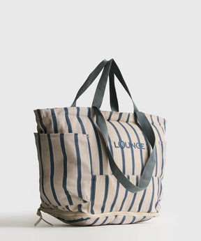 Bolso Playero Antiarena de Lounge con múltiples bolsillos y asas para llevar cómodamente.