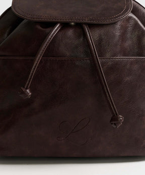 Mochila Icons Woman de Lounge, mochila mediana de cuero marrón con cordón ajustable y cierre magnético.