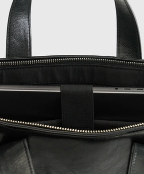 Interior view of Mochila Notebook Icons Woman by Lounge, showing padded compartment for laptop and zipper details.