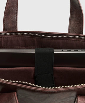Interior view of Mochila Notebook Icons Woman by Lounge with laptop compartment and zip closure.