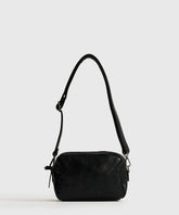 Cartera Bandolera Icons Woman de Lounge, bolso negro pequeño con dos compartimentos y strap ajustable.