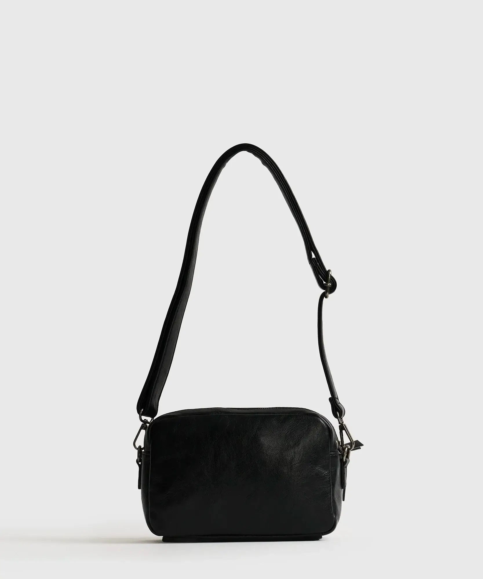 Cartera Bandolera Icons Woman de Lounge, pequeña y elegante con strap removible, ideal para organizar tus esenciales.