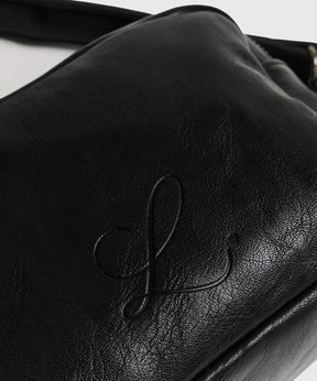 Cartera Bandolera Icons Woman de Lounge, pequeña y elegante, con diseño de cuero negro destacado.