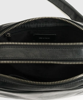Interior view of Cartera Bandolera Icons Woman by Lounge with compartments and zipper.