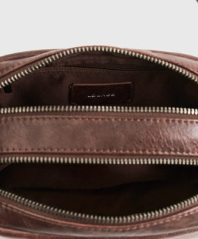 Interior view of Cartera Bandolera Icons Woman by Lounge showing zipper pockets and organization compartments.