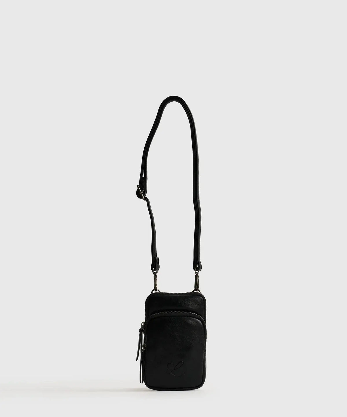 Mini Cartera Icons Woman de Lounge, color negro, con strap ajustable y bolsillo frontal.