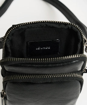 Mini Cartera Icons Woman - interior del bolso de la marca Lounge con compartimento principal y bolsillo frontal.