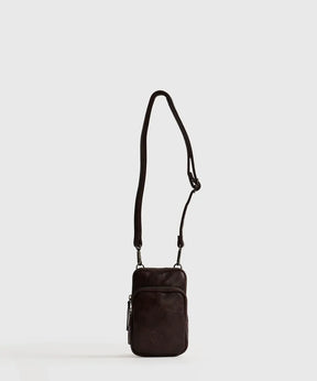 Mini Cartera Icons Woman de Lounge, burdeos, con strap ajustable y bolsillo frontal.