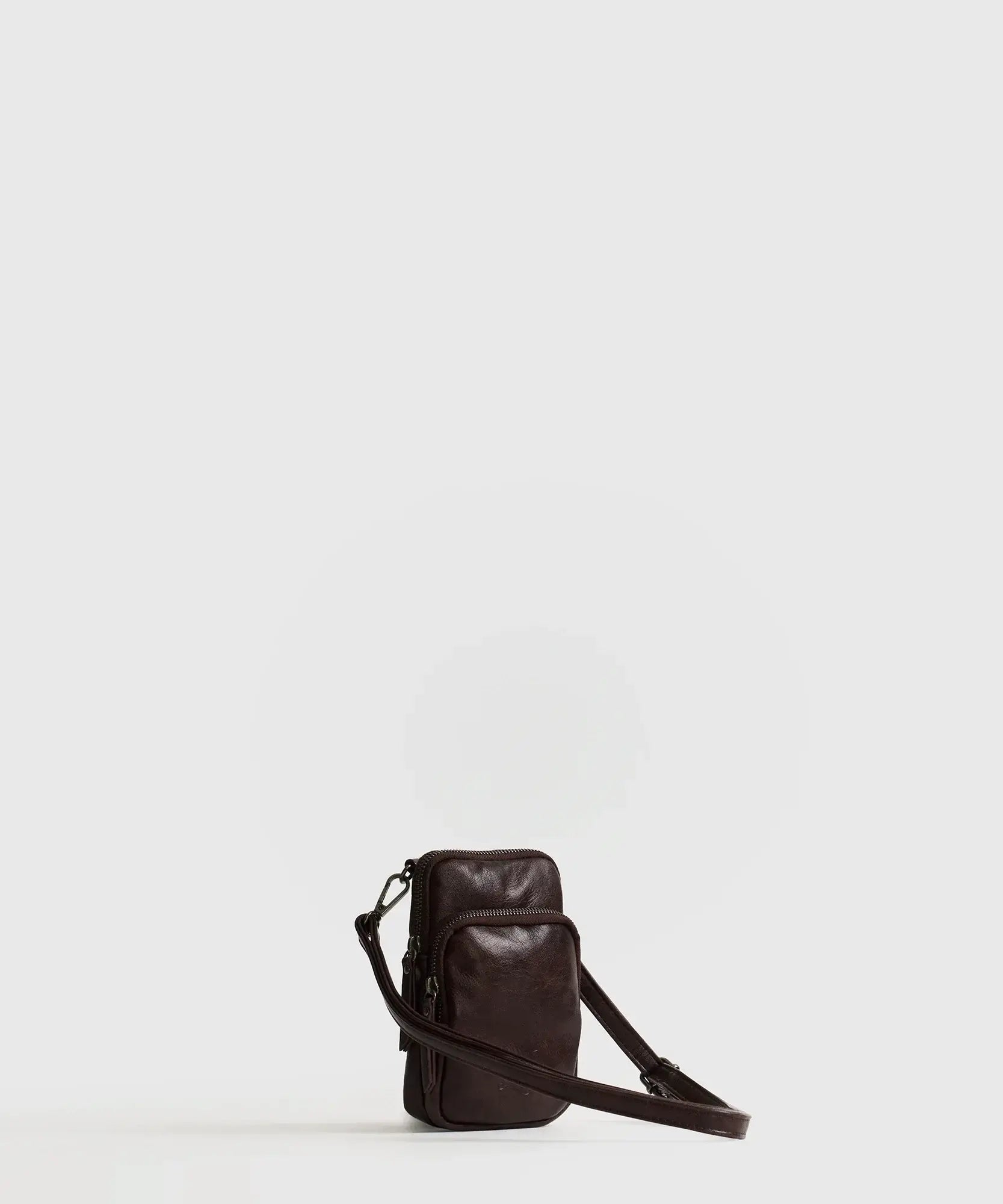 Mini Cartera Icons Woman de Lounge, bolso de teléfono con compartimentos y strap ajustable.