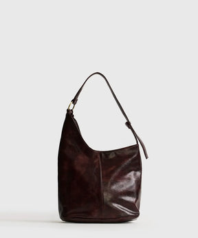 Cartera De Hombro Asimétrica de Lounge con diseño elegante y asa ajustable, perfecta para mantener tus esenciales organizados.