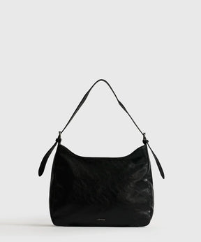 Cartera De Hombro Eclat negra de Lounge, bolso cuadrado con strap ajustable y amplio espacio para organización.