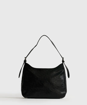 Cartera De Hombro Eclat de Lounge, bolso cuadrado negro con strap ajustable y amplio compartimento.