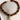 Collar Charm Conchita de resina en tonos tierra y charm conchita, marca Lounge, color naranjo.
