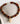 Collar Charm Conchita de resina en tonos tierra y charm conchita, marca Lounge, color naranjo.