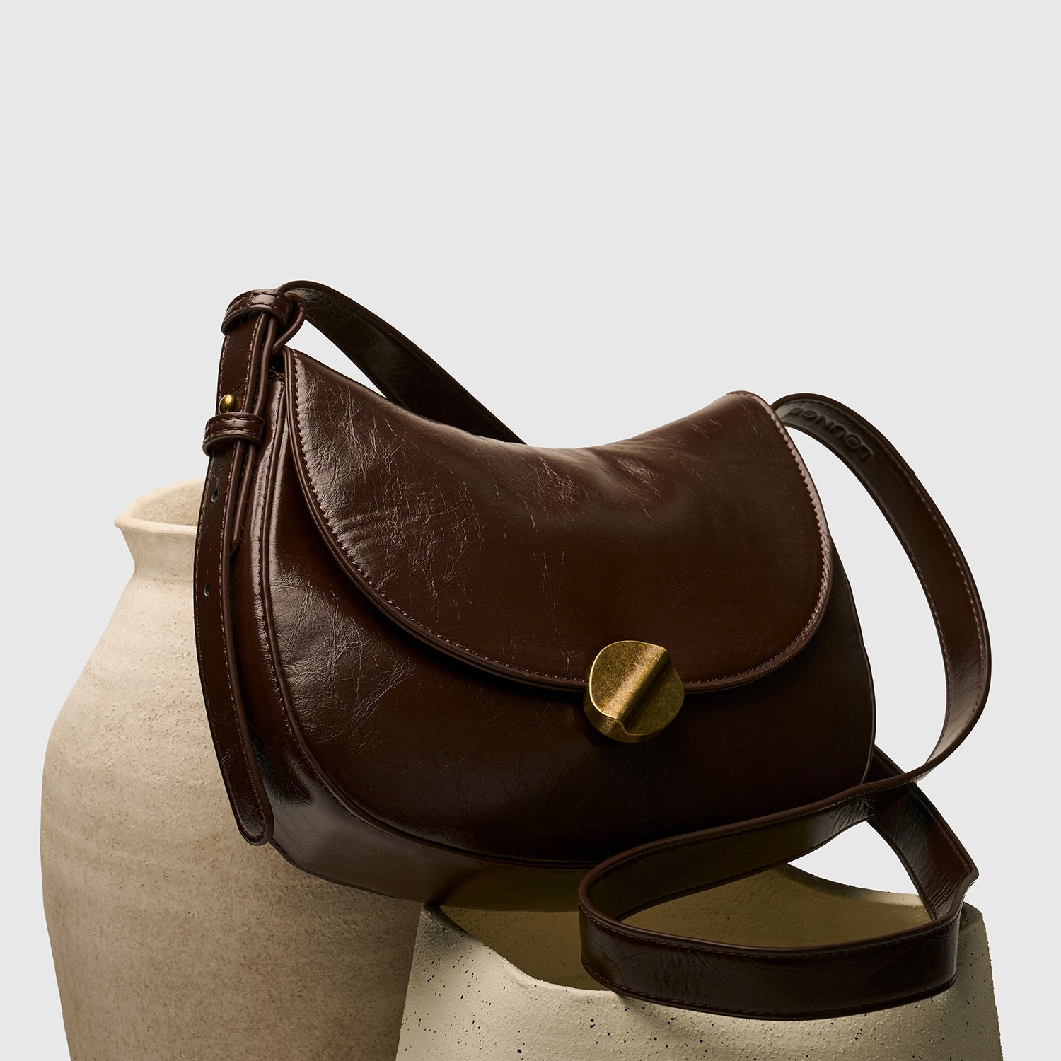 Cartera Bandolera Medialuna Broche
